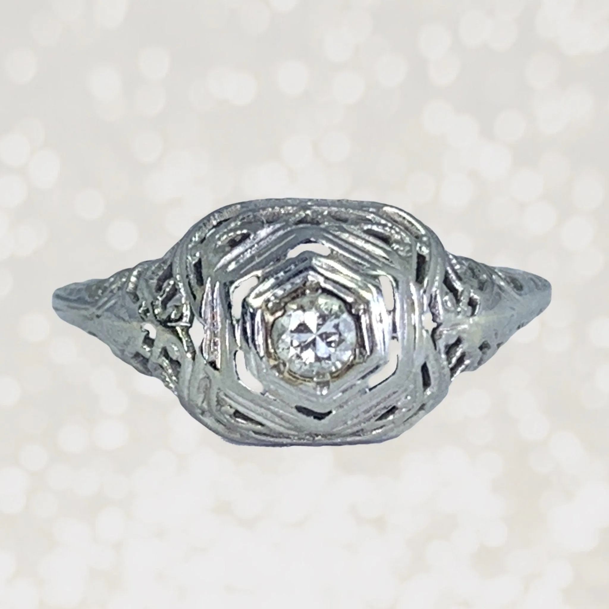 1920s Art Deco Diamond Engagement Ring in a 18K White Gold Filigree Setting. Estate Jewelry.