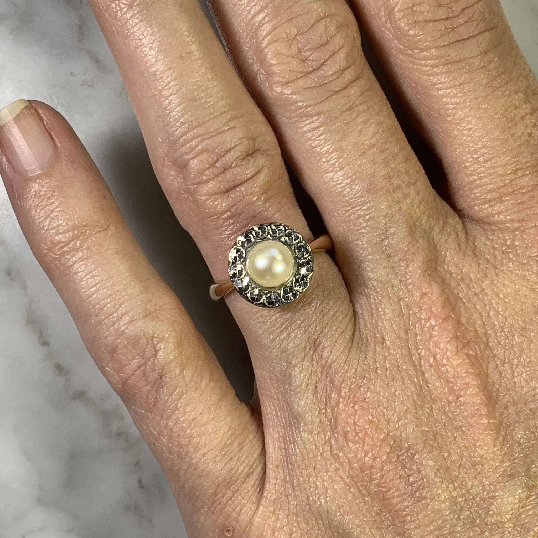 1940s Pearl Engagement Ring set in 14K White and Rose Gold. Sustainable Estate Jewelry.